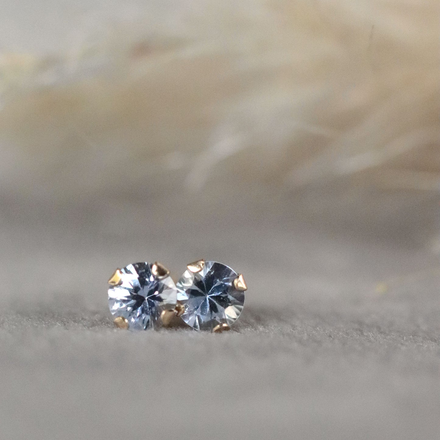 Light Blue Sapphire Stud Earrings in 14k Gold