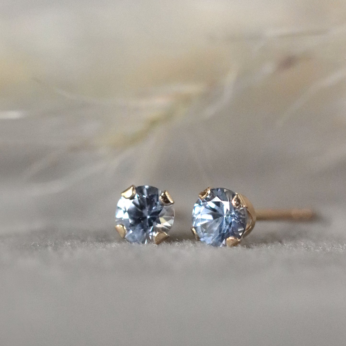 Light Blue Sapphire Stud Earrings in 14k Gold