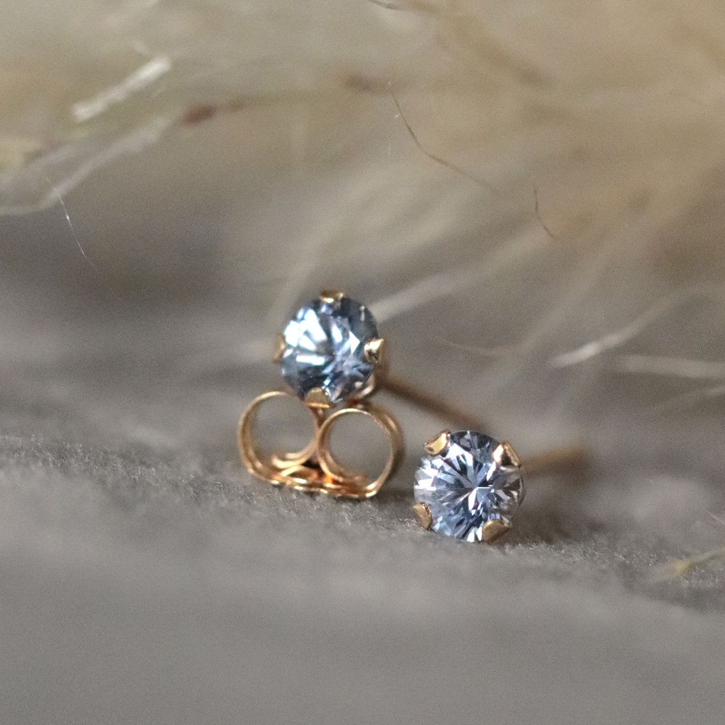 Light Blue Sapphire Stud Earrings in 14k Gold