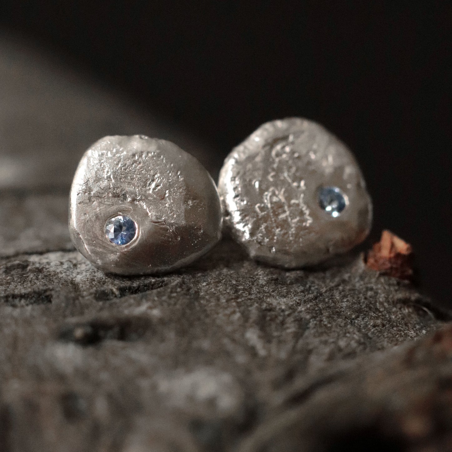 Molten Silver Stud Earrings with Blue Sapphire