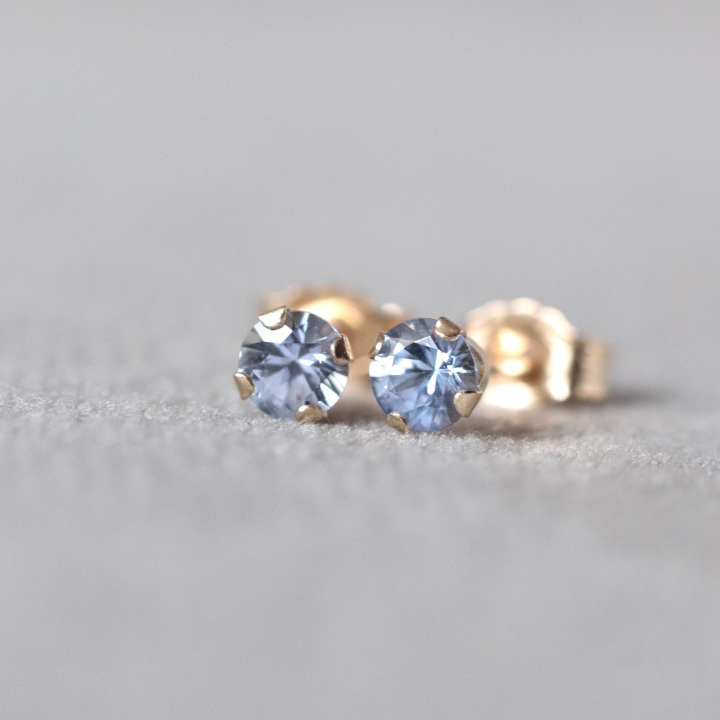 Light Blue Sapphire Stud Earrings in 14k Gold