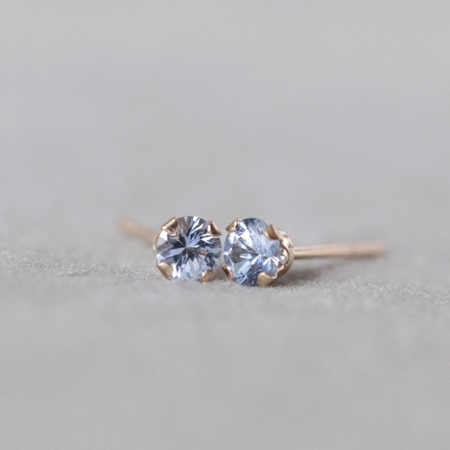 Light Blue Sapphire Stud Earrings in 14k Gold