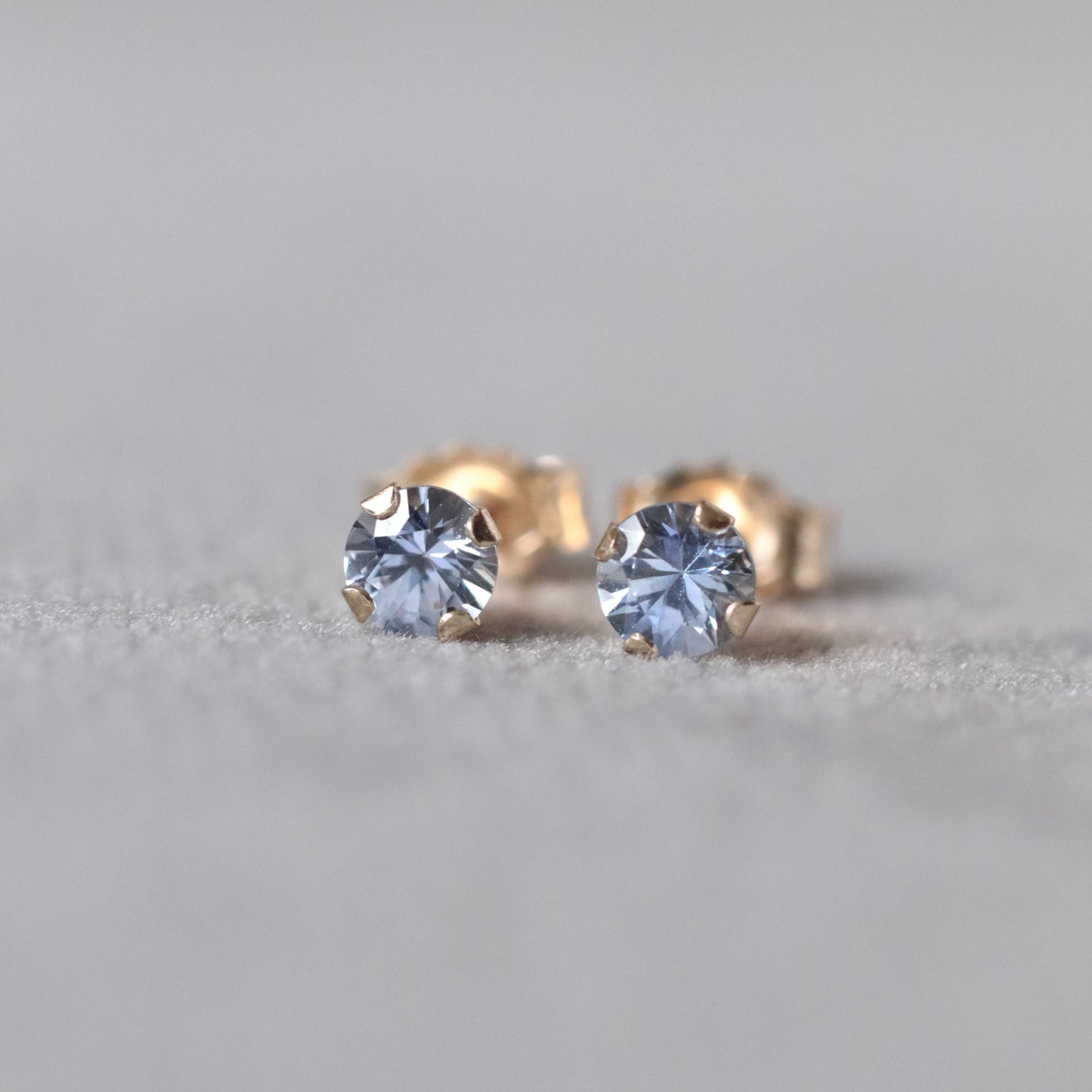 Light Blue Sapphire Stud Earrings in 14k Gold