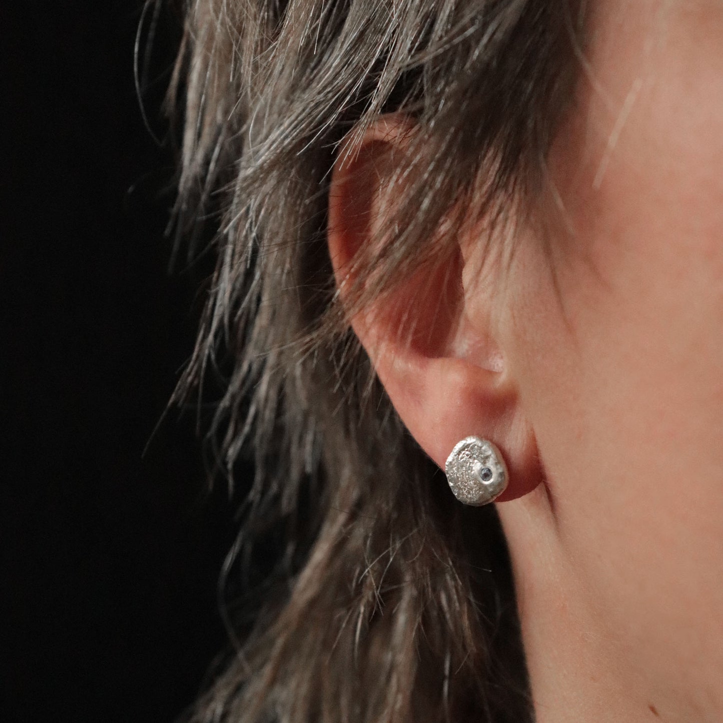Molten Silver Stud Earrings with Blue Sapphire