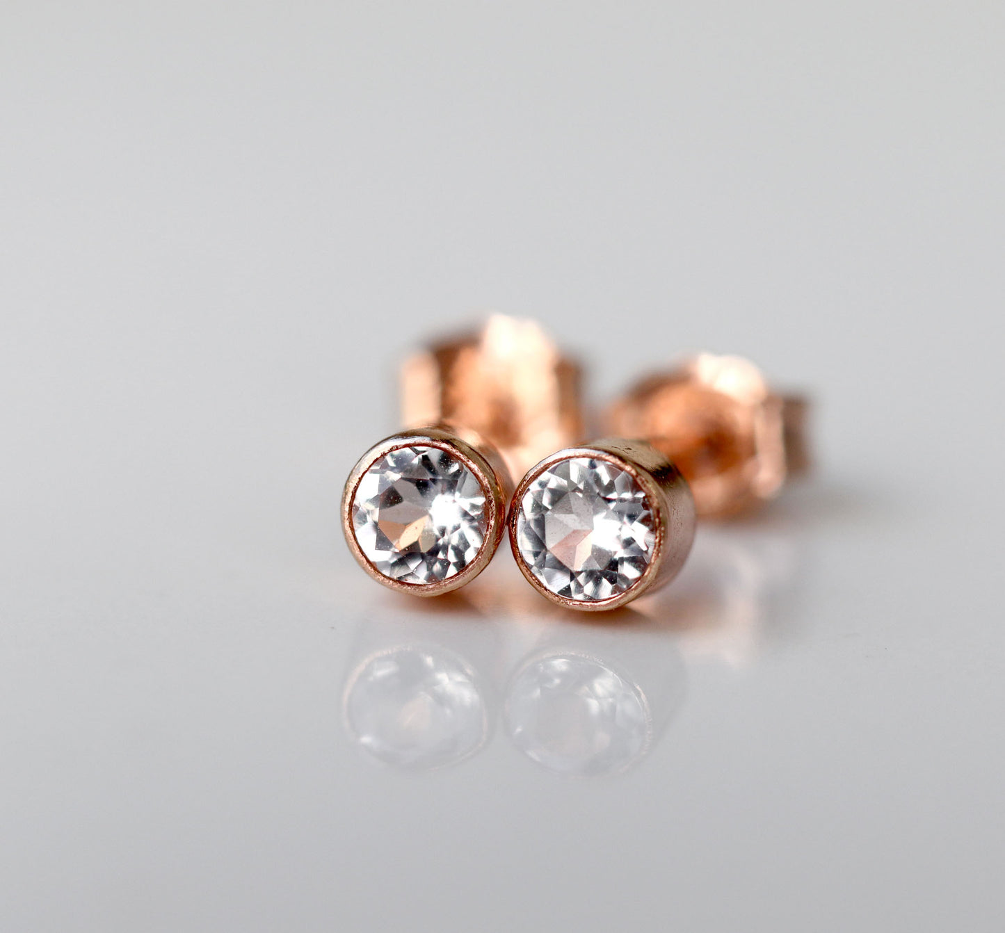 Tiny White Topaz Rose Gold Stud Earrings