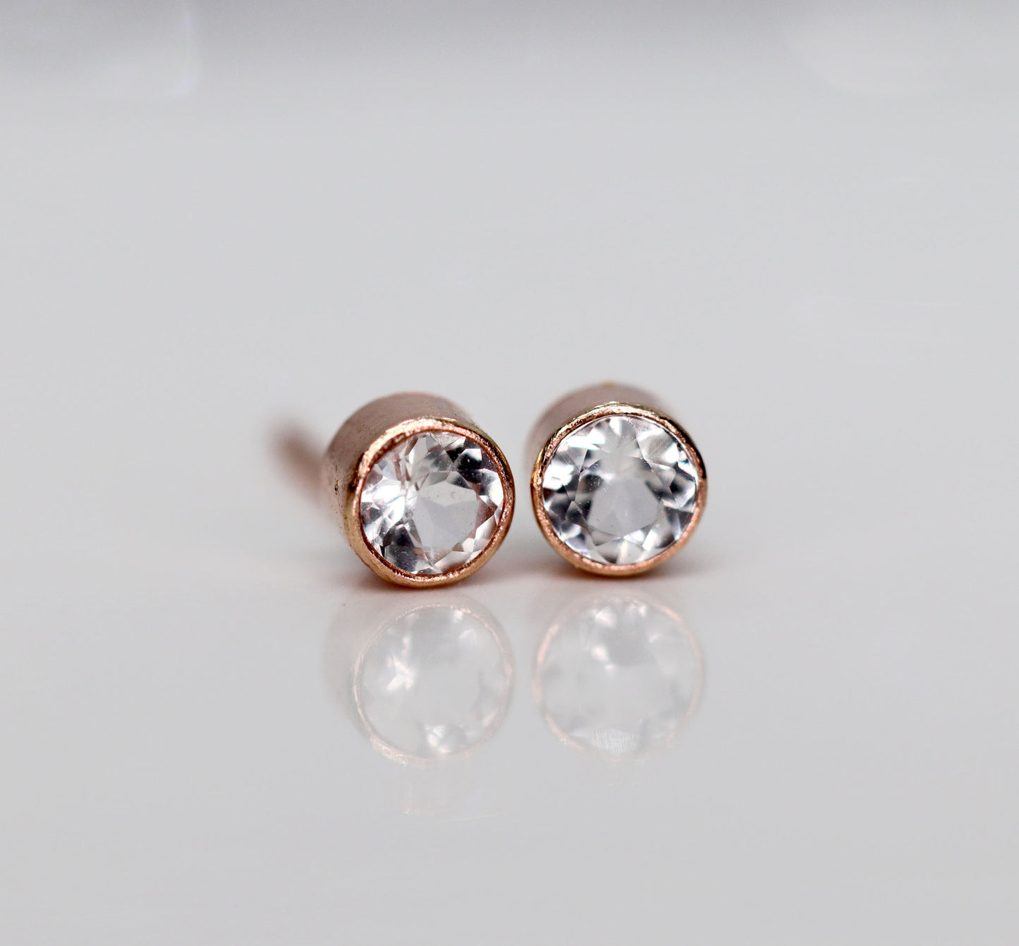 Tiny White Topaz Rose Gold Stud Earrings