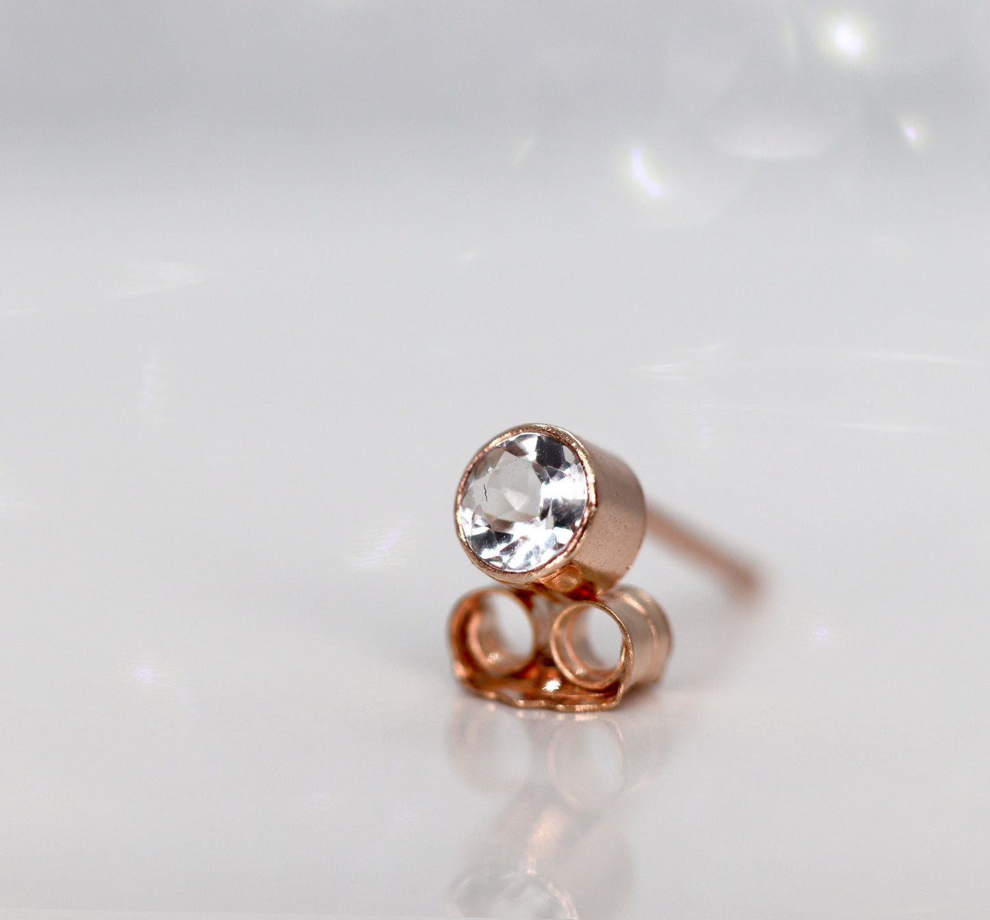 Tiny White Topaz Rose Gold Stud Earrings